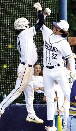 Cooper Young and Cooper Wilburn celebrate during a recent game. TREY NORRIS/Staff