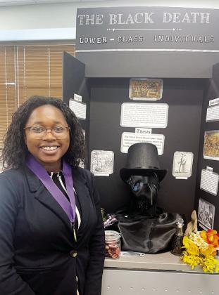 Yasmin Farley placed first with her project on The Black Death. COURTESY OF GCSU