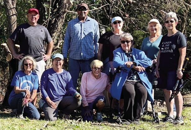 Members of the Milledgeville Garden Club, Oconee Master Gardeners and friends of the cemetery spent several hours in Memory Hill removing dead shrubs, a large portion of a dead cedar, a great deal of unwanted vegetation and generally tidying an area along the northwest fence. Pictured are (front row): Sherrill Jones, Donna Bennett, Elizabeth Wells, Harriett Whipple and Sara Brantley; back row: Chris Connell, Robert Surry, Sandy Connell and Linda Poyner.
