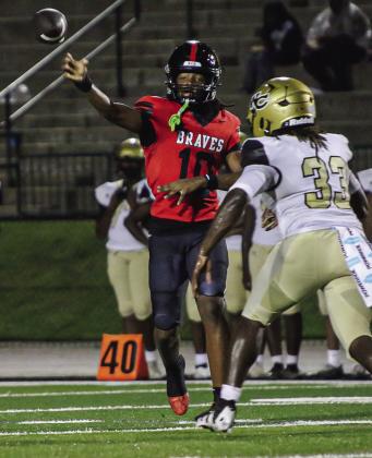 Baldwin junior quarterback Kamden Patterson, pictured earlier in the season vs. Washington County, threw for six touchdowns last Friday night against Howard. TREY NORRIS/Staff