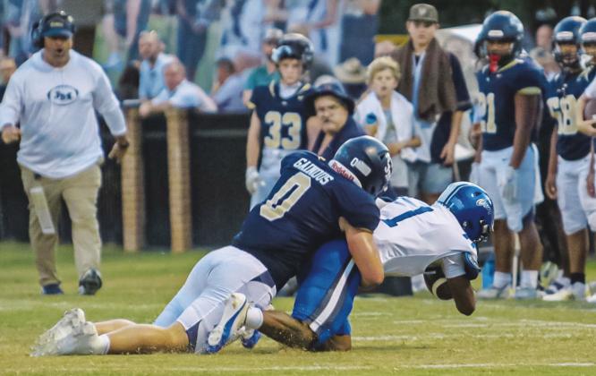 Linebacker Abe Gainous makes one of the seven total tackles he had vs. Brookstone last Friday in Milledgeville. TREY NORRIS/Staff