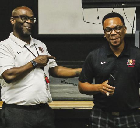 Baldwin athletic director Dexter Ricks introduces Jimmy Fields as the Braves new head basketball coach. CONTRIBUTED