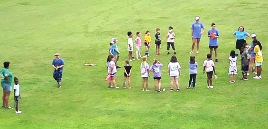 Everyday, campers play recreation games. In this photo, they are learning ultimate frisbee. CONTRIBUTED