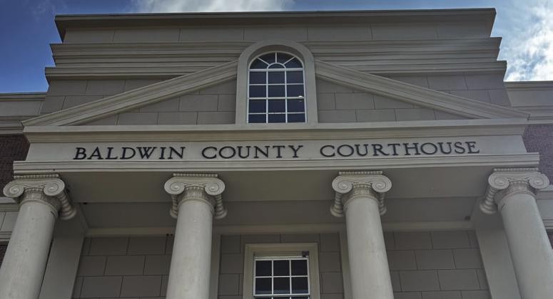 Commissioners approve millage rate, among jeers