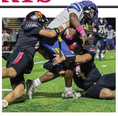 Both teams fought for every inch last Friday night at Davenport Field. TREY NORRIS/Staff