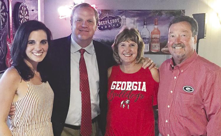 Dantzler (second from left) with wife Emily and Larry and Sharon Edwards. CONTRIBUTED