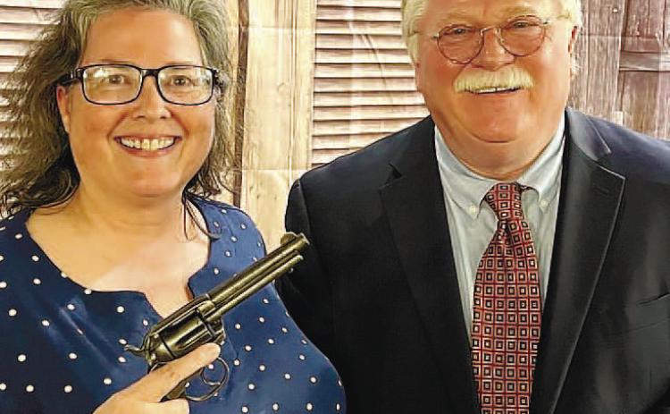 Sheryl McCollum with Putnam County Sheriff Howard Sills. CONTRIBUTED