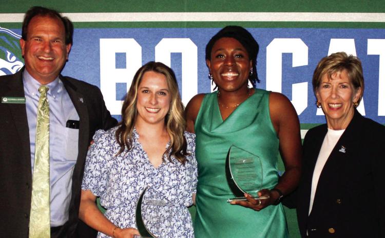 Athletic Director Wendell Staton, Whitney Okvist Pape, Shanteona Keys, and Georgia College President Cathy Cox. JULIA JENSEN/ Georgia College