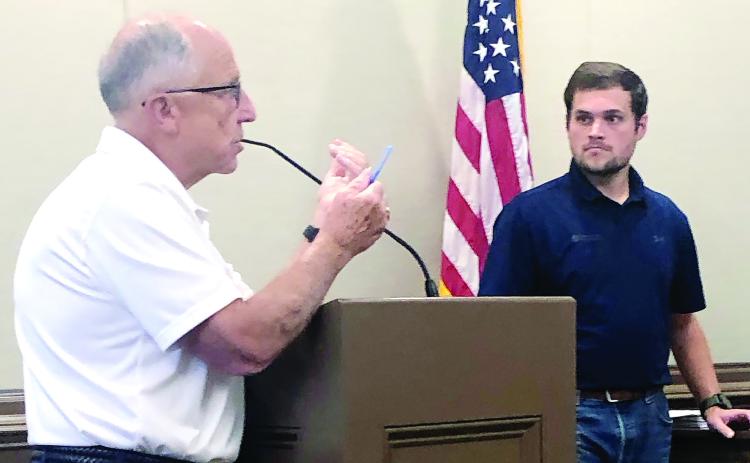 Simonton Engineering representative Paul Simonton discusses intersections as Simonton Engineering representative Corey Johnson listens GREENBERRY MOORE/Staff