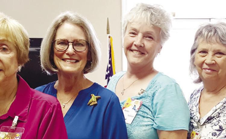 Pictured with the club officers, left to right, are Secretary Judy Hill, President Cecile Parker, speaker Sherrill Jones, Co-president Karen Gulrich, Vice President Malinda Perrin, and Treasurer Pat Johnson. CONTRIBUTED