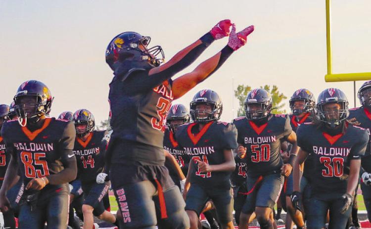 Baldwin High School will invest in new protective fear for the boys’ tackle football program and girls’ flag football team through a grant from the Arthur M. Blank Family Foundation. CONTRIBUTED