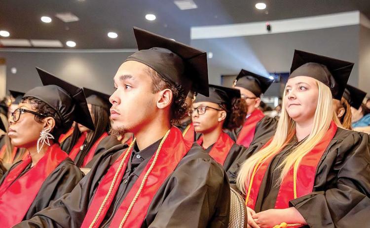Georgia Military College students prepare to receive their degrees. COURTESY OF GMC