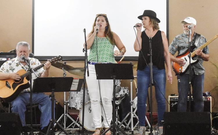 Randy Newton and the Flamingo Road Live Show played music at the Creative Corner Friday evening in Allen’s Market.