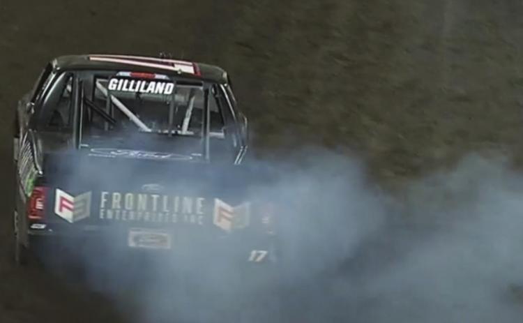Todd Gilliland celebrates with a burnout after winning Saturday’s Truck Series Clean Harbors 150 at Knoxville (IA) Raceway. (Getty Images)