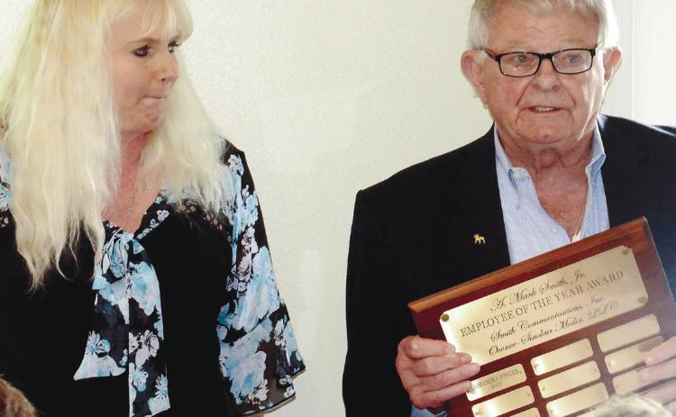 Smith Communications Business Manager Cassandra Fowler is announced as the 2022 Employee of the Year by President and CEO A. Mark Smith Sr. IAN TOCHER/Staff