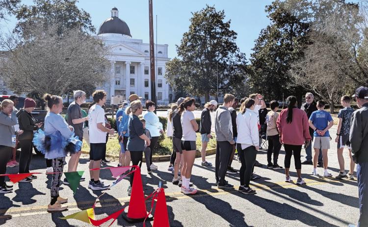 5K participants prepare to start the race. ANDREW BROWN/Staff