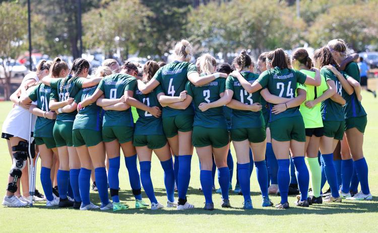 Bobcat soccer huddles before big game. | Courtesy of GC Athletics