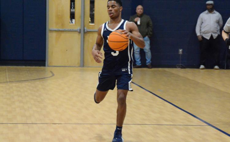 JMA senior Jalan Butts (3) has been a major contributor for the Trojans this season. LANCE MCCURLEY/File Photo