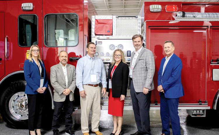 Fouts Bros. team members at Home Day standing with Congressman Scott Austin (center) included, from left, CFO Jessica Talley-Peterson, EVP Operations Gary Pacilio, Executive Vice President Heather Edens, CEO & President Scott Edens, and EVP Sales & Business Development John Slawson.