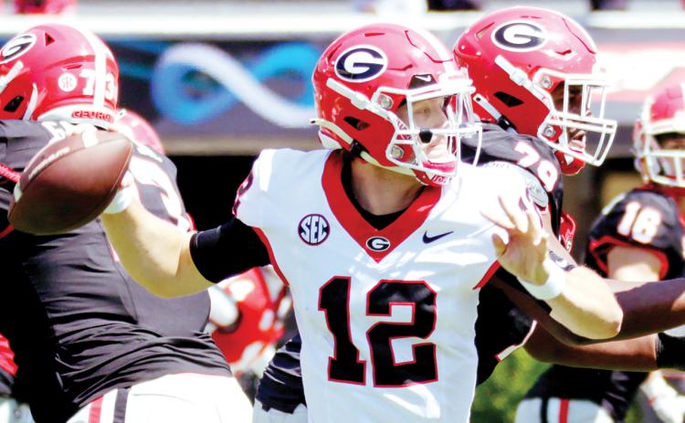 Ryan Puglisi attempted a combined 49 passes during Saturday’s G-Day scrimmage. BRAD HARRISON/Staff