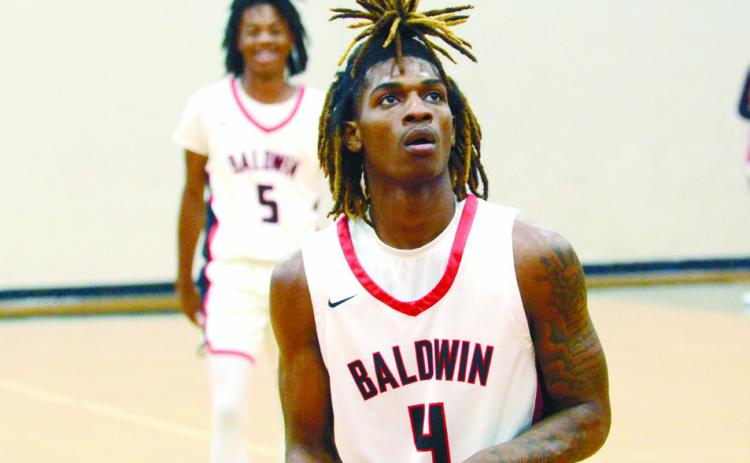 Tremarius Lawrence lines up for a free throw. BRENDAN KOERNER/Staff