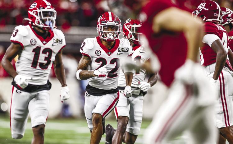 Javon Bullard (22) jogs out onto the field during the 2022 College Football Playoff National Championship game in Indianapolis, Ind., at Lucas Oil Stadium on Jan. 10. COURTESY OF UGA ATHLETICS