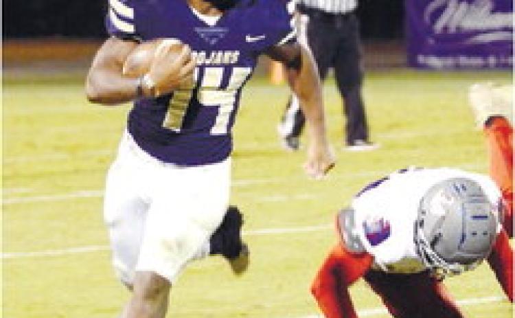 Javian Butts (14) rushes past a defender during a quarter_nal game against The Heritage School. IAN TOCHER/Staff