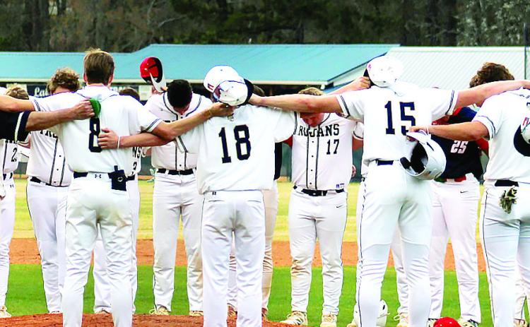 After Thursday’s matchup, both teams joined together and concluded the competition with a prayer. SKYLA MORRIS/Staff