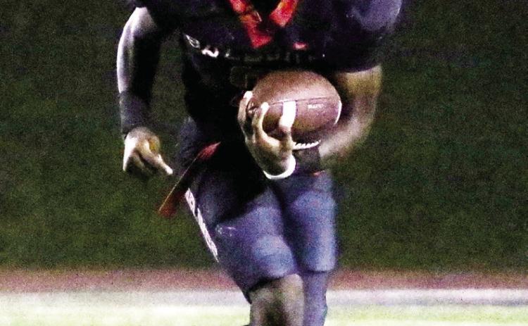 Junior running back Sadur Salahuddin scored twice to help keep the Braves’ hopes alive last Friday against Northside. TREY NORRIS/Staff