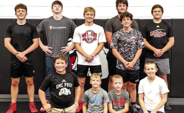 Campers learned the fundamentals of wrestling and participated in supervised ‘turtle’ wrestling matches. COURTESY OF GMC