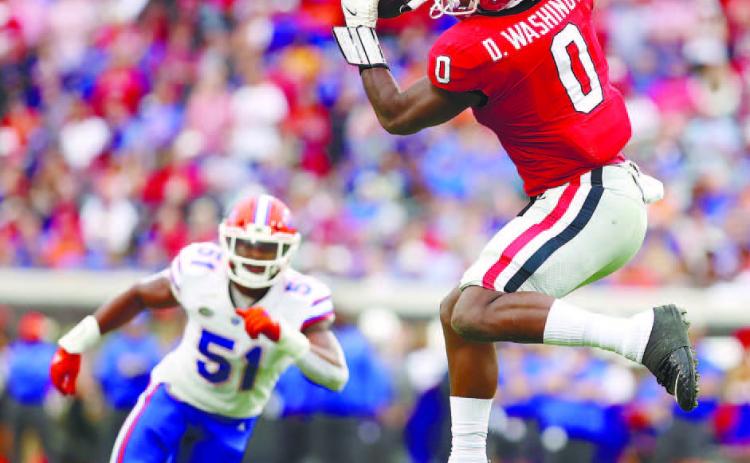Georgia tight end Darnell Washington (0) makes an athletic grab against Florida this past Saturday. TONY WALSH/UGA Athletics