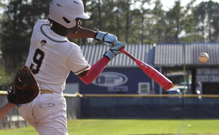 Freshman Gus Cummings leads the Trojans in batting average (.429) and On Base Percentage (.556).” TREY NORRIS/Staff