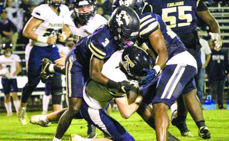 Bud Veal (3), who caught two touchdown passes in JMA’s playoff win last Friday against the Tiftarea Panthers, had a strong defensive game, too, assisting in several key tackles. TREY NORRIS/Staff