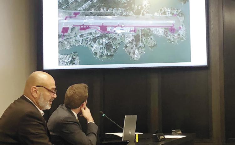 Commissioners discussing the plans regarding the county-owned airport and its five-year plan. GREENBERRY MOORE/Staff