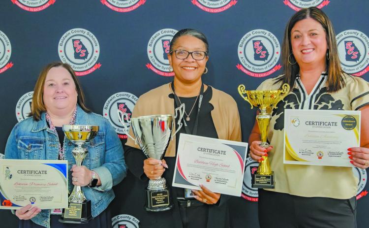 L-R: Lakeview Primary Principal Dr. Tracy Clark accepted the Stop-the-Prop Award, Baldwin High School Principal Markeeta Clayton accepted the Greatest Employee Attendance award, and Lakeview Academy Vice-Principal Heather Chancellor accepted the Greatest Student Attendance Award. CONTRIBUTED