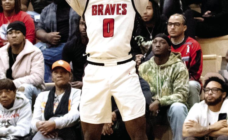 Karez Demory had 14 points and 10 rebounds in the Braves matchup versus Harlem last Tuesday in Milledgeville. TREY NORRIS/Staff