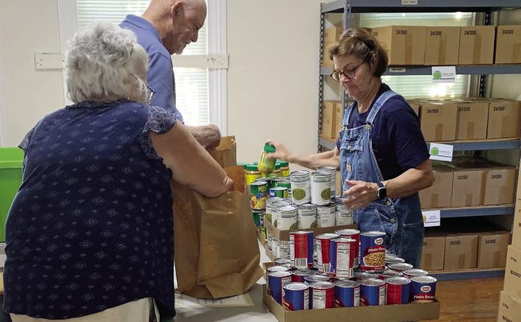 The pantry is staffed by volunteers from local community groups and churches and serves 500 a month families, as of June this year. CONTRIBUTED
