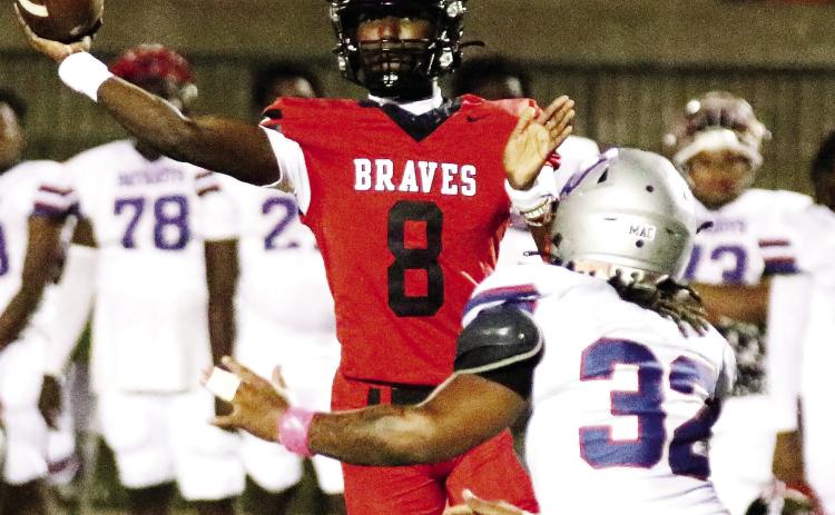 Braves quarterback LJ Pounds scored three touchdowns on the ground last Thursday against Howard in Macon. TREY NORRIS/Staff