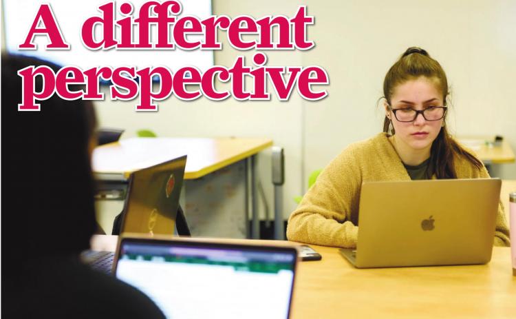Sophomore Alexandra Furney describes translating the letters of immigrants as a “transformative” experience for her. CONTRIBUTED