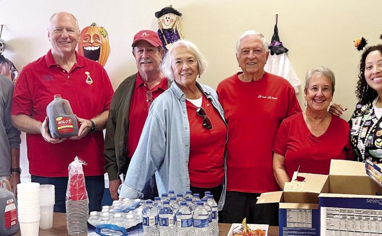 Several Lake Oconee Elks and Auxiliary members visited the Georgia War Veterans Home in Milledgeville on Oct. 29, to celebrate Octoberfest with residents there. The Elks Lodge Chuck Wagon boiled brats in beer, then grilled and served them with sauerkraut to the veterans, along with hot pretzels. Candy was also given out as a Halloween treat. CONTRIBUTED