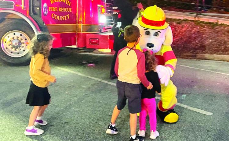 Baldwin County Fire Rescue’s dalmatian mascot, Sparky, is ready to teach fire safety and give lots of hugs.