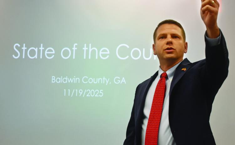 Baldwin County Commission Chair Andrew Strickland delivered the State of the County address at Eggs and Issues at Central Georgia Technical College. BAILEY BALLARD/Staff