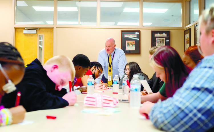 Students write down ideas on how to spread awareness and prevent bullying within the school district. CONTRIBUTED