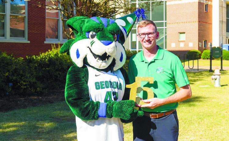 Creator of Thunder, Jason Hendrix, celebrates Thunder’s 15th birthday. COURTESY OF GCSU