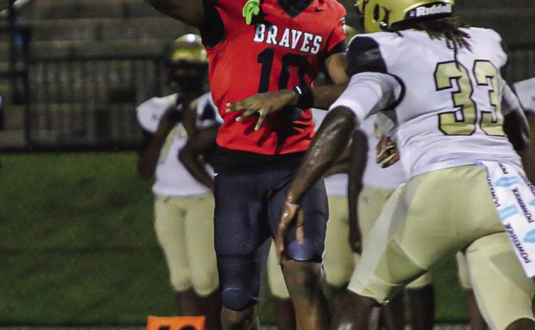 Baldwin junior quarterback Kamden Patterson, pictured earlier in the season vs. Washington County, threw for six touchdowns last Friday night against Howard. TREY NORRIS/Staff