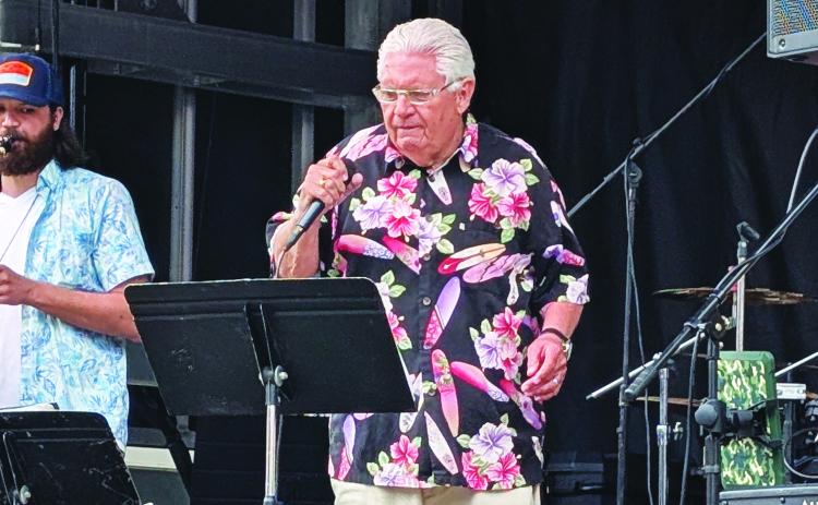 Greg Stephens, lead singer of the band ‘Reunion’ performing at First Friday. Stephens has been a part of the band for 42 years. ANDREW BROWN Staff
