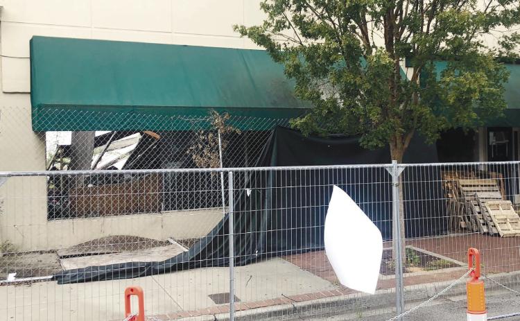 The building at 107-115 S. Wayne St. is in such bad shape the collapsed roof is visible from the street. GREENBERRY MOORE/Staff