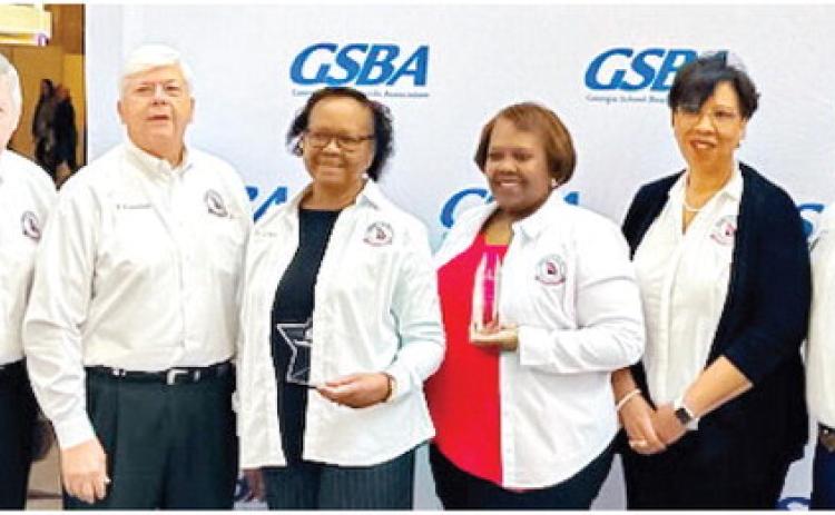 L-R: Board member Lynn Chandler, board member Wes Cummings, board chair Dr. Gloria Wicker, board vice-chair Shannon D. Hill, Superintendent Dr. Noris Price and board member John Jackson. CONTRIBUTED