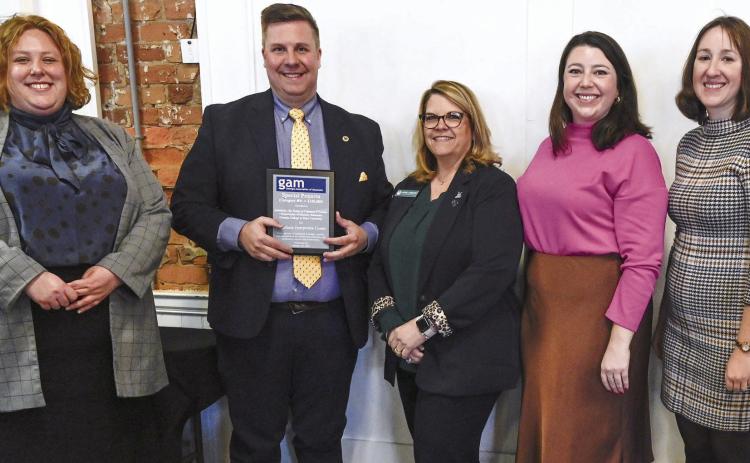 L-R: Andalusia curator Cassie Munnell, Director of Historic Museums Matt Davis and Executive Director for the School of Continuing &amp; Professional Studies Angela Criscoe accepted the award from GAM President Marcy Breffle and GAM President-Elect Rebecca Bush. COURTESY OF GCSU