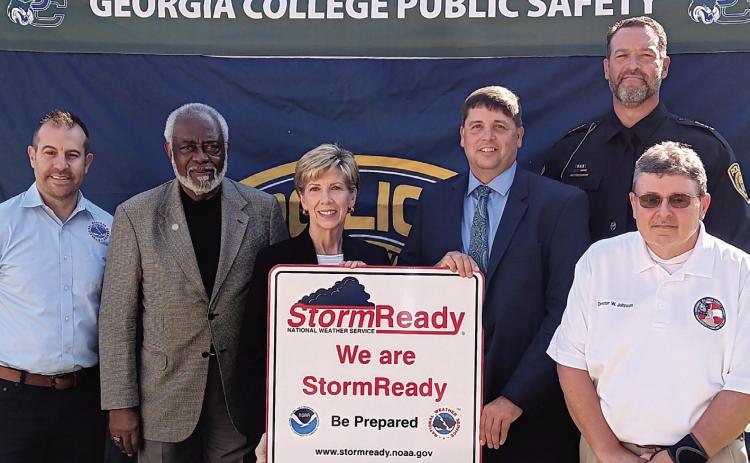 L-R: David Nadler, of the National Weather Service; Georgia State Rep. Floyd Griffin Jr.; Georgia College President Cathy Cox; Jeremy Nobles, associate director of Emergency Management at GCSU; GCSU Public Safety Chief Wes Hardin; and Baldwin County Emergency Management Department Director Wayne Johnson. COURTESY OF GCSU
